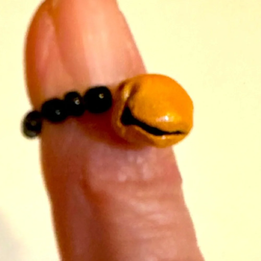 VTG ORANGE BELL BEADED RING CHARM HALLOWEEN JEWELRY HANG ON NECKLACE CORD .25”